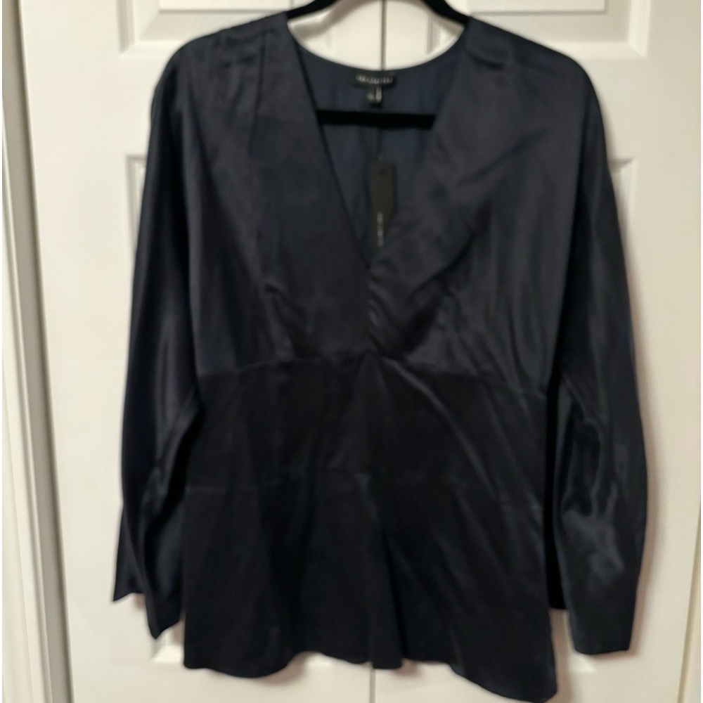 Women’s size large, limited, navy blue suede, silk fitted blouse.